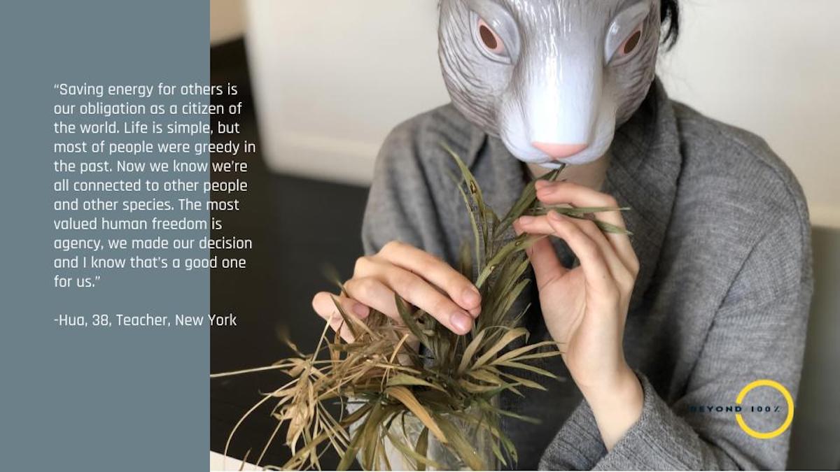 Person in bunny man eating plant